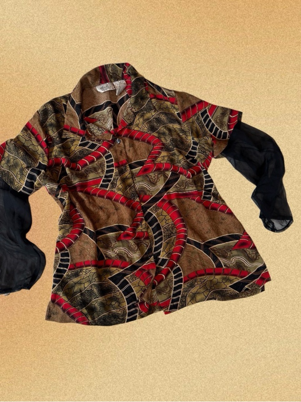 Vibrant Abstract Print Button-Up Blouse with Sheer Black Sleeves